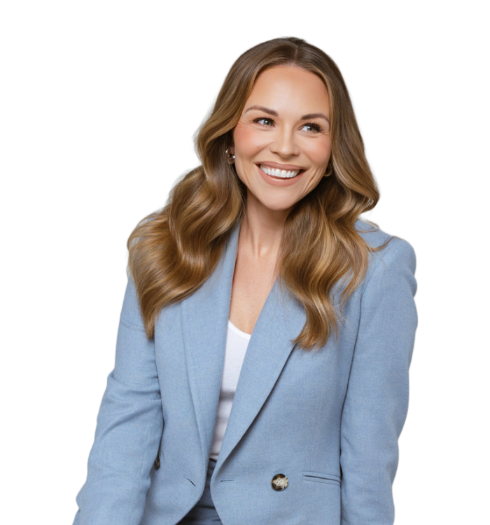 Julie Solomon in a blue suit, smiling