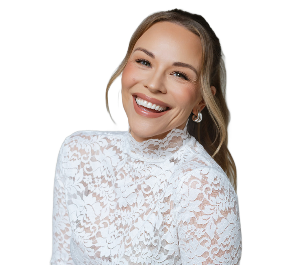Julie Solomon laughing in a white lace top