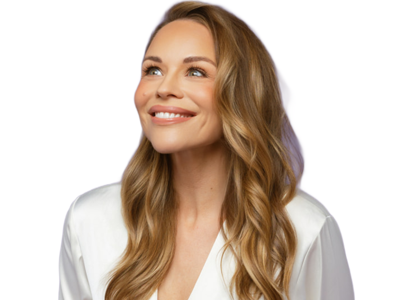 Julie Solomon in a white satin top, smiling