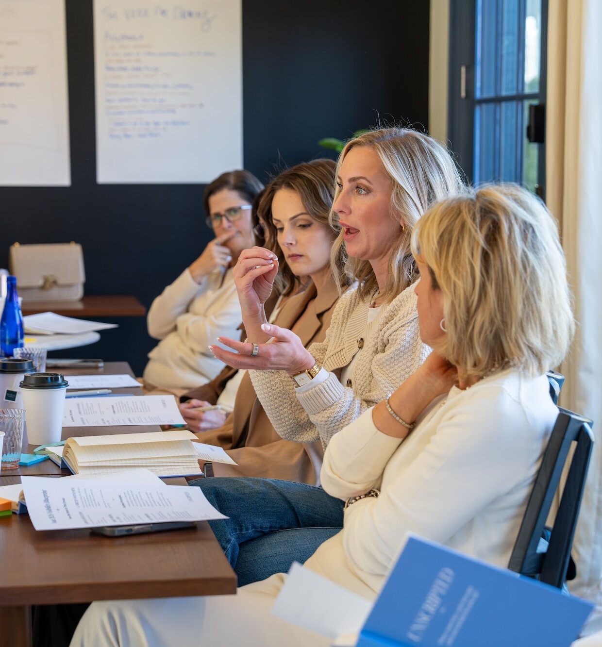 Women together during a session at the Unscripted retreat